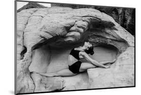 Female gymnast in desert, Overton, Nevada, USA-Pete Saloutos-Mounted Photographic Print