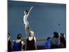 Female Gymnast Performing on a Balance Beam-null-Mounted Photographic Print