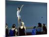 Female Gymnast Performing on a Balance Beam-null-Mounted Photographic Print