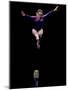 Female Gymnast Performing on the Balance Beam-null-Mounted Photographic Print
