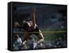 Female High Jumper Clearing a Bar-null-Framed Stretched Canvas