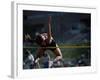 Female High Jumper Clearing a Bar-null-Framed Photographic Print