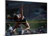 Female High Jumper Clearing a Bar-null-Mounted Photographic Print