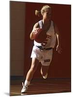 Female High School Basketball Player in Action During a Game-null-Mounted Photographic Print