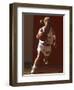 Female High School Basketball Player in Action During a Game-null-Framed Photographic Print