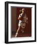 Female High School Basketball Player in Action During a Game-null-Framed Photographic Print