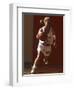 Female High School Basketball Player in Action During a Game-null-Framed Photographic Print