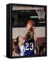 Female High School Basketball Players in Action During a Game-null-Framed Stretched Canvas