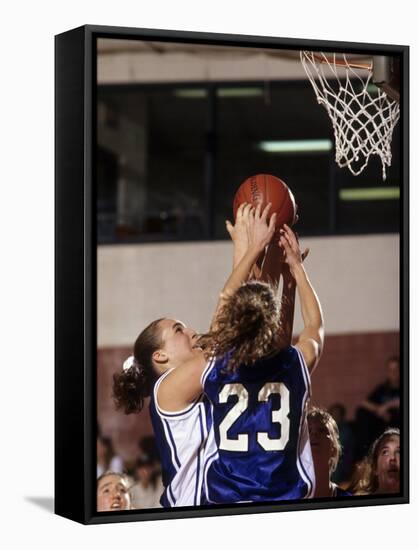 Female High School Basketball Players in Action During a Game-null-Framed Stretched Canvas