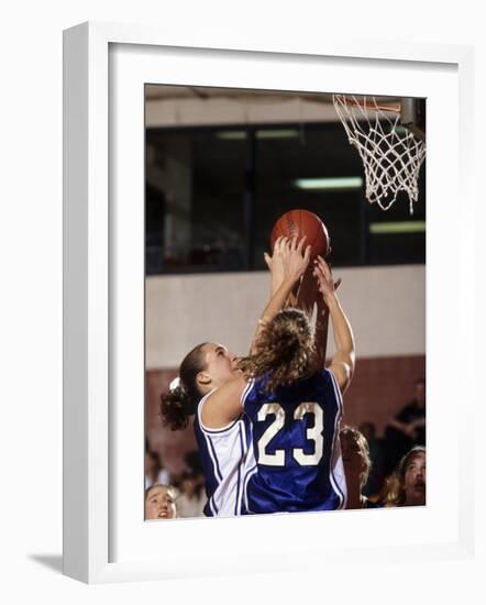 Female High School Basketball Players in Action During a Game-null-Framed Photographic Print