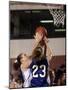 Female High School Basketball Players in Action During a Game-null-Mounted Photographic Print