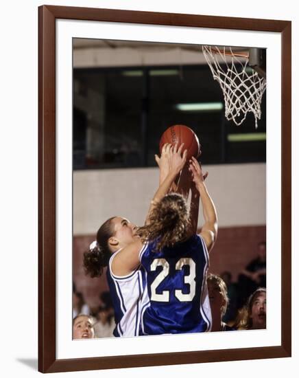 Female High School Basketball Players in Action During a Game-null-Framed Photographic Print