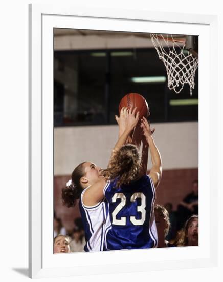 Female High School Basketball Players in Action During a Game-null-Framed Photographic Print
