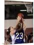 Female High School Basketball Players in Action During a Game-null-Mounted Photographic Print