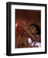 Female High Schooll Basketball Player in Action Shooting a Free Throw During a Game-null-Framed Premium Photographic Print