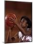 Female High Schooll Basketball Player in Action Shooting a Free Throw During a Game-null-Mounted Photographic Print