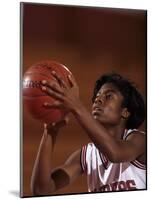 Female High Schooll Basketball Player in Action Shooting a Free Throw During a Game-null-Mounted Photographic Print