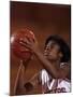 Female High Schooll Basketball Player in Action Shooting a Free Throw During a Game-null-Mounted Photographic Print
