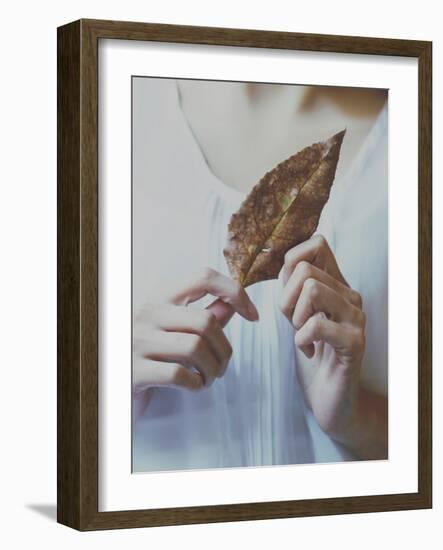 Female Holding a Leaf-Carolina Hernandez-Framed Photographic Print