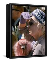 Female Holding Pink Poodle Wearing Hat Emblazoned with Reagan During Campaign Speech-Bill Ray-Framed Stretched Canvas