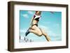 Female Hurdle Runner Leaping over the Hurdle-mezzotint-Framed Photographic Print