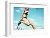 Female Hurdle Runner Leaping over the Hurdle-mezzotint-Framed Photographic Print