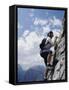 Female Mountain Climber Looking Up-null-Framed Stretched Canvas