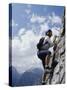 Female Mountain Climber Looking Up-null-Stretched Canvas