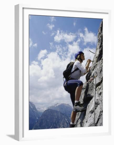 Female Mountain Climber Looking Up-null-Framed Premium Photographic Print