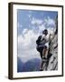 Female Mountain Climber Looking Up-null-Framed Premium Photographic Print