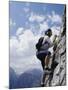 Female Mountain Climber Looking Up-null-Mounted Premium Photographic Print