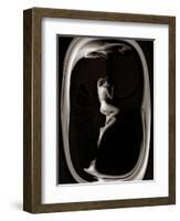 Female Nude Sleeping on Black Background in Oval Frame-Winfred Evers-Framed Photographic Print