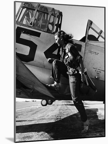 Female Pilot of the Us Women's Air Force Service Posed with Her Leg Up on the Wing of an Airplane-Peter Stackpole-Mounted Photographic Print