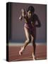 Female Runner at the Start of a Track Race-null-Stretched Canvas