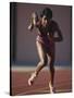 Female Runner at the Start of a Track Race-null-Stretched Canvas