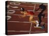 Female Runner at the Start of a Track Race-null-Stretched Canvas