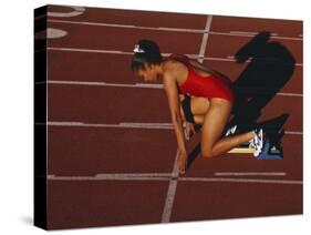 Female Runner at the Start of a Track Race-null-Stretched Canvas