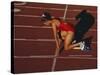 Female Runner at the Start of a Track Race-null-Stretched Canvas