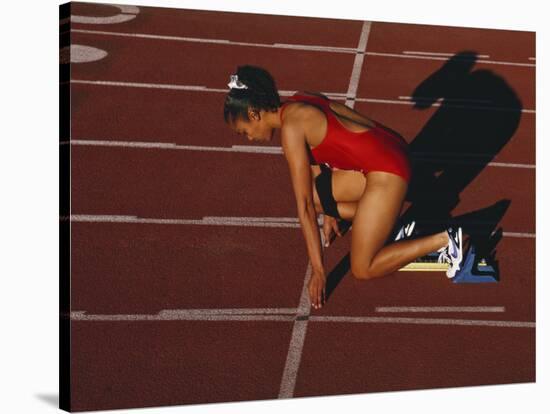 Female Runner at the Start of a Track Race-null-Stretched Canvas