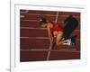 Female Runner at the Start of a Track Race-null-Framed Photographic Print