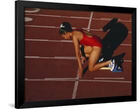 Female Runner at the Start of a Track Race-null-Framed Photographic Print