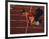 Female Runner at the Start of a Track Race-null-Framed Photographic Print