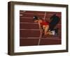 Female Runner at the Start of a Track Race-null-Framed Photographic Print