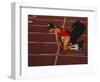 Female Runner at the Start of a Track Race-null-Framed Photographic Print