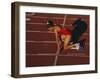 Female Runner at the Start of a Track Race-null-Framed Photographic Print