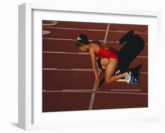 Female Runner at the Start of a Track Race-null-Framed Photographic Print