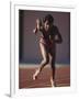 Female Runner at the Start of a Track Race-null-Framed Photographic Print