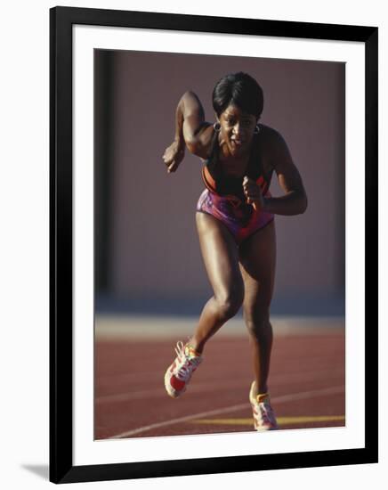 Female Runner at the Start of a Track Race-null-Framed Photographic Print