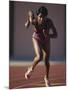 Female Runner at the Start of a Track Race-null-Mounted Photographic Print