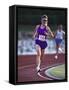 Female Runner Competing in a Track Race-null-Framed Stretched Canvas